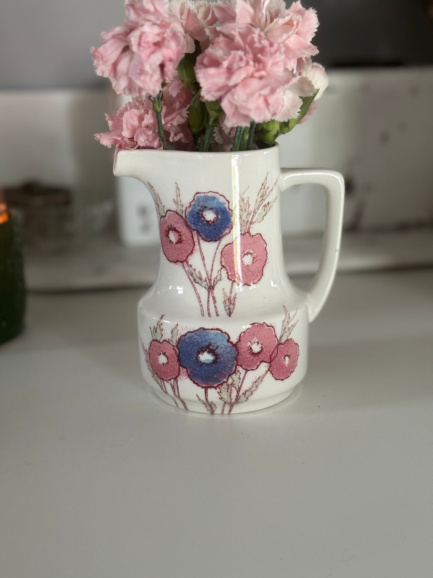 Medley creamer with pinks and blues