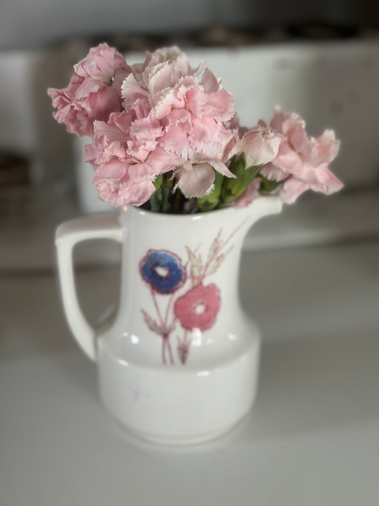 Medley creamer with pinks and blues